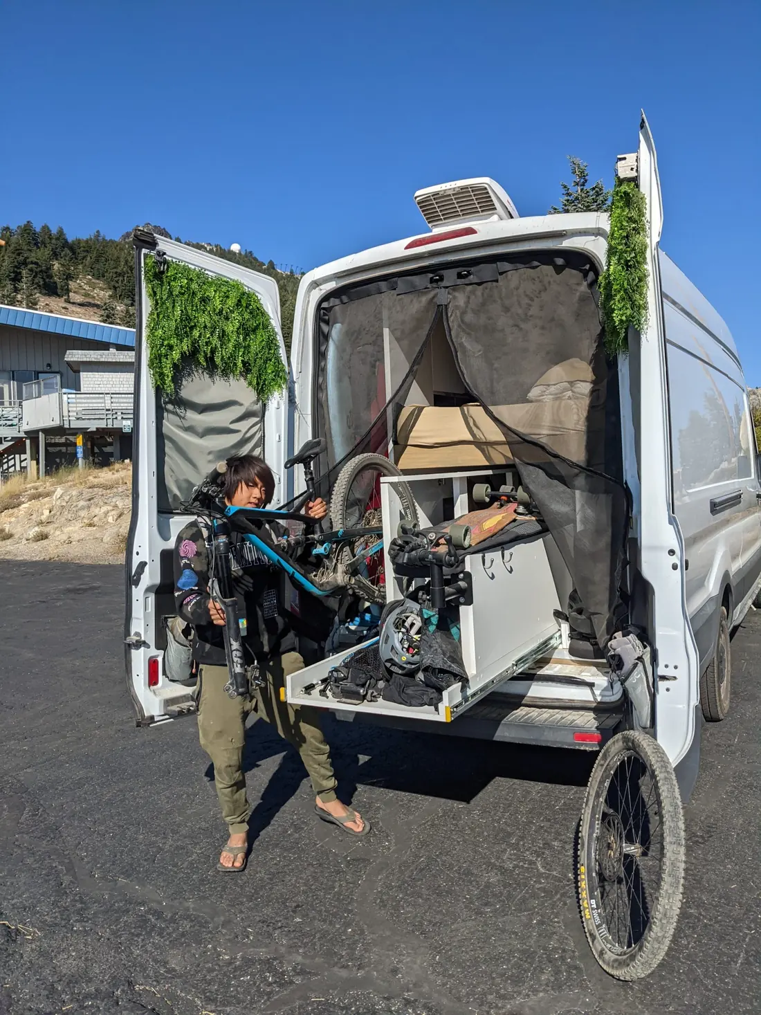Loading a mountain bike into the garage under the bed